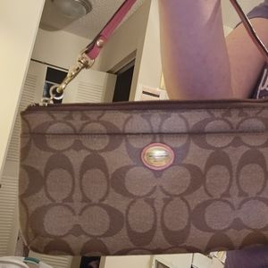 Coach signature wristslet tan and coral